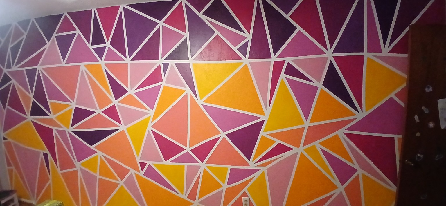 Colorful geometric mural painted by Heather Hanlin